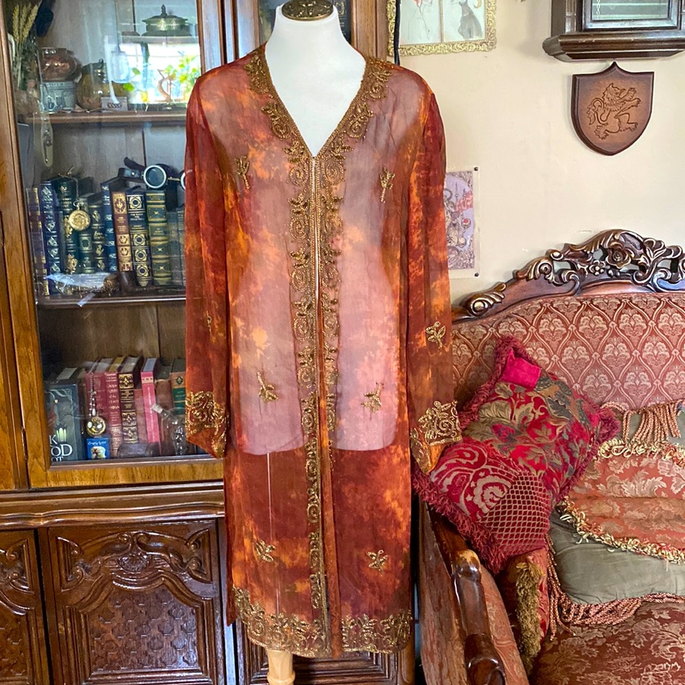 Sheer cover up. Made in India size M. Rust colour.